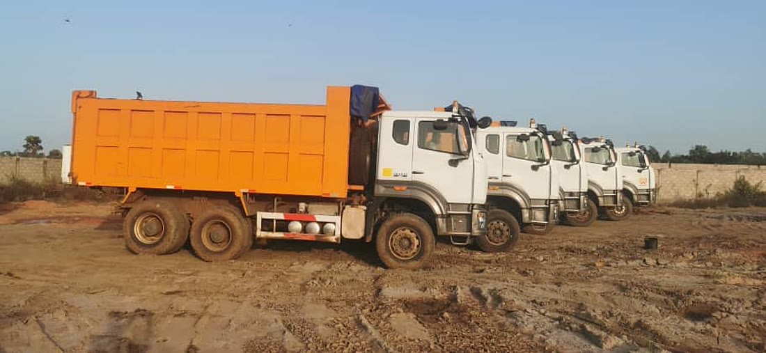 Fleet of construction trucks